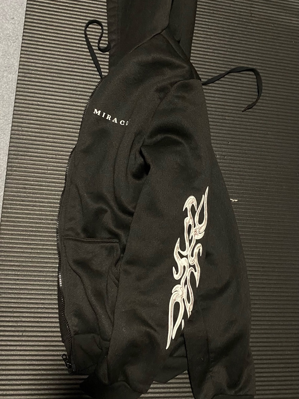 Miracle Black Hooded Jacket with White Tribal Sleeve Graphic